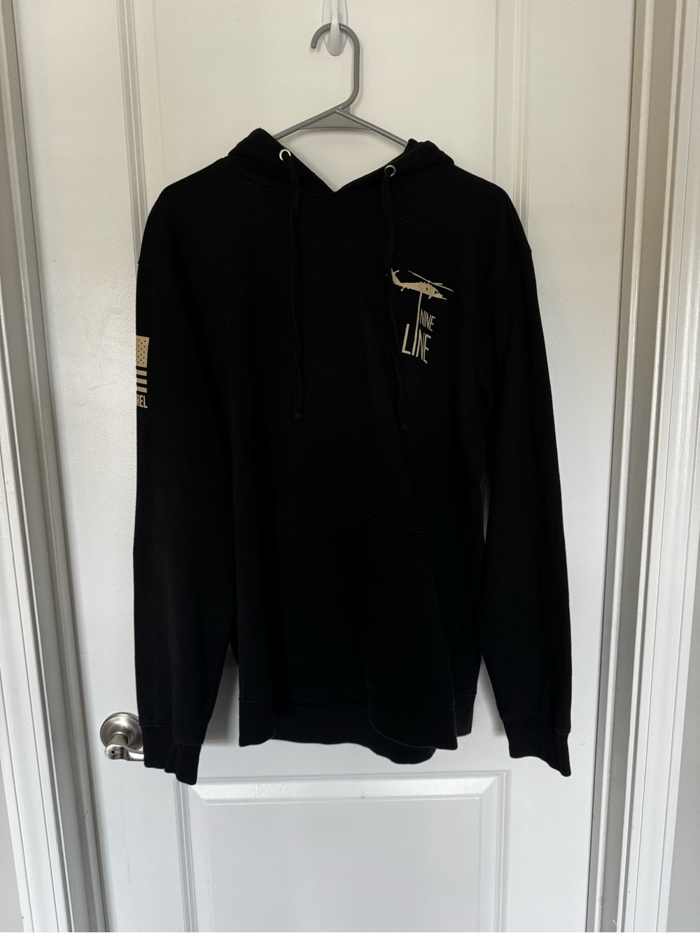 Black Hooded Pullover Sweatshirt with Cream Graphic
